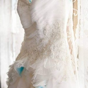 Galina Signature wedding gown from David's Bridal with turquoise accents size 10